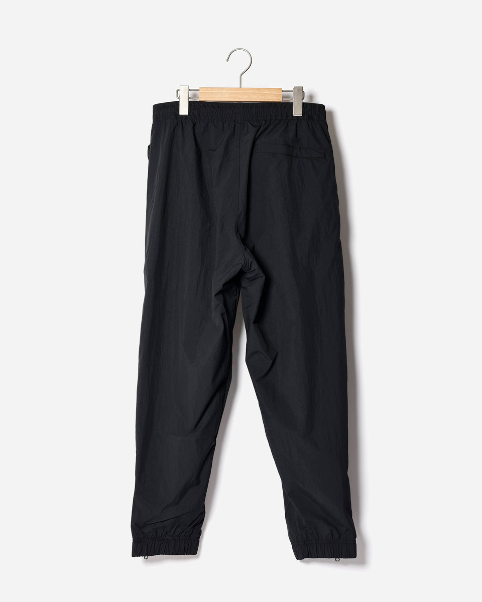 NIKE SOLO SWOOSH WOVEN TRK PANT – A+S