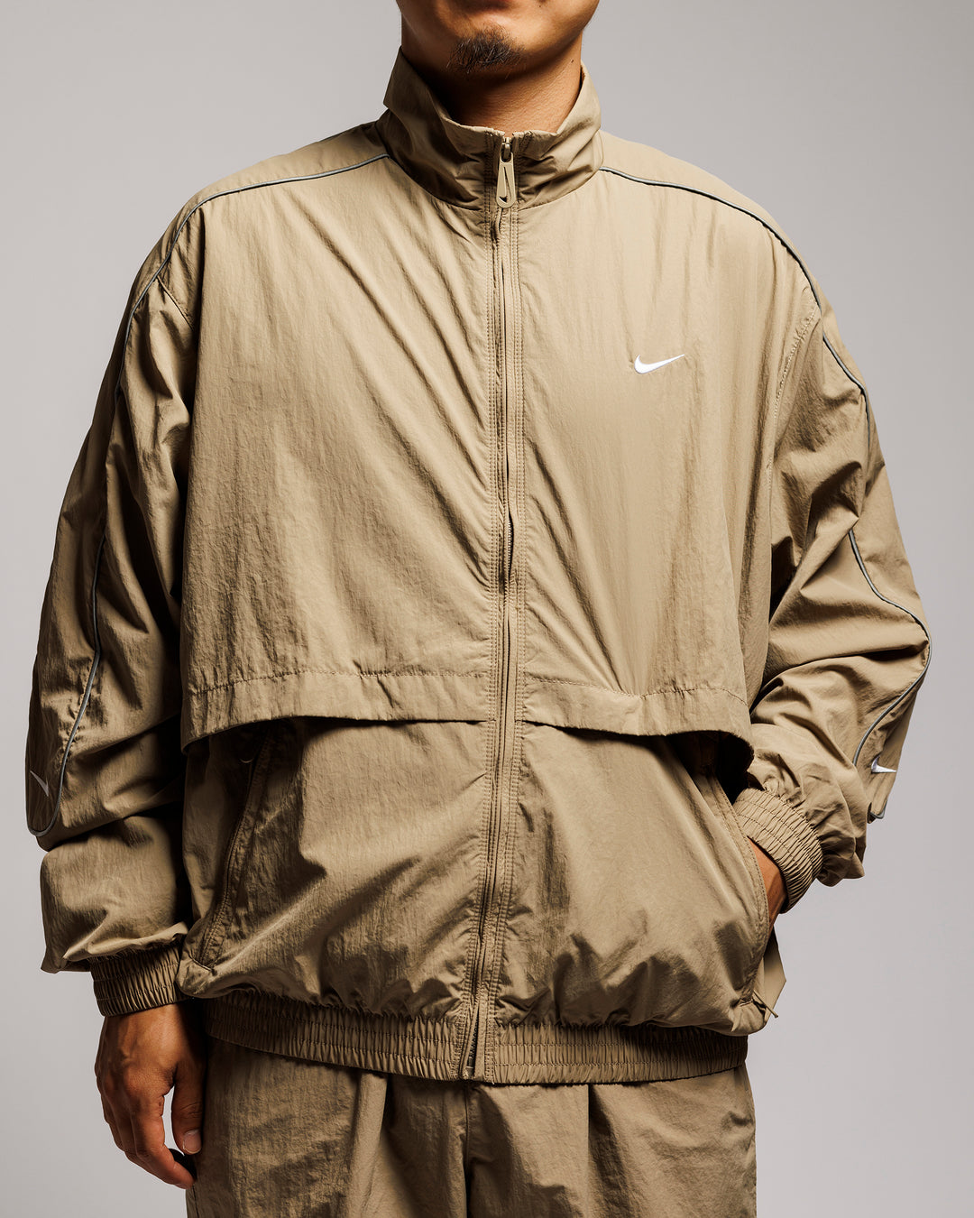 Nike swoosh track jacket online